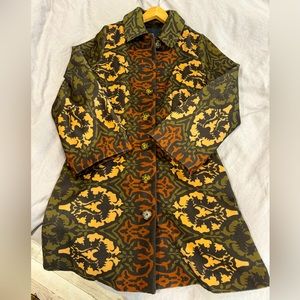 Anthropologie - Mid length button up coat with bell sleeves.